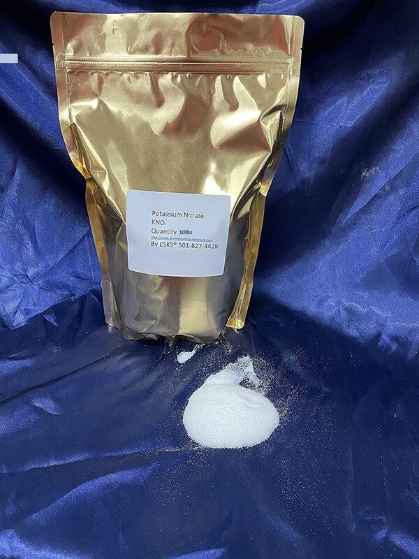 Potassium nitrate 10lbs package with visible label on gold foil bag, white powder spilled on blue surface, related to explosive target supplies.
