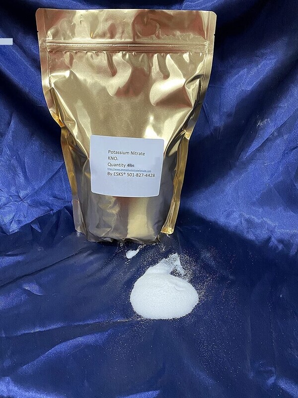 Potassium Nitrate 4lbs package with label on gold pouch, spilled powder on blue surface, relevant to pyrotechnic and explosive products.