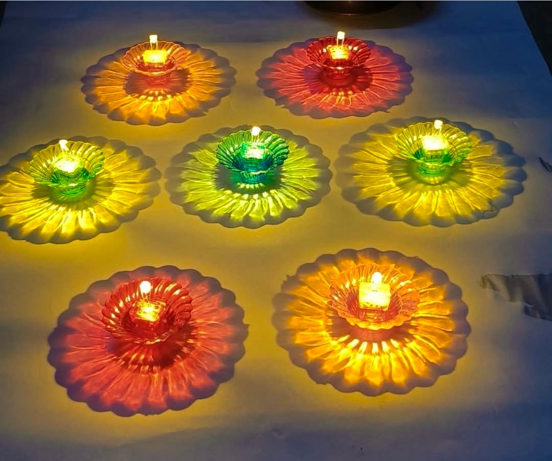 Water reflecting diyas