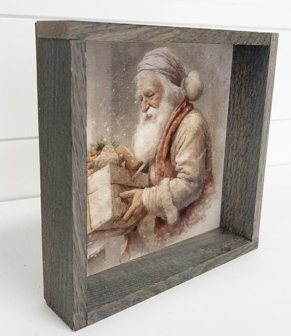 Vintage Santa Preparing Gifts Framed Canvas Print