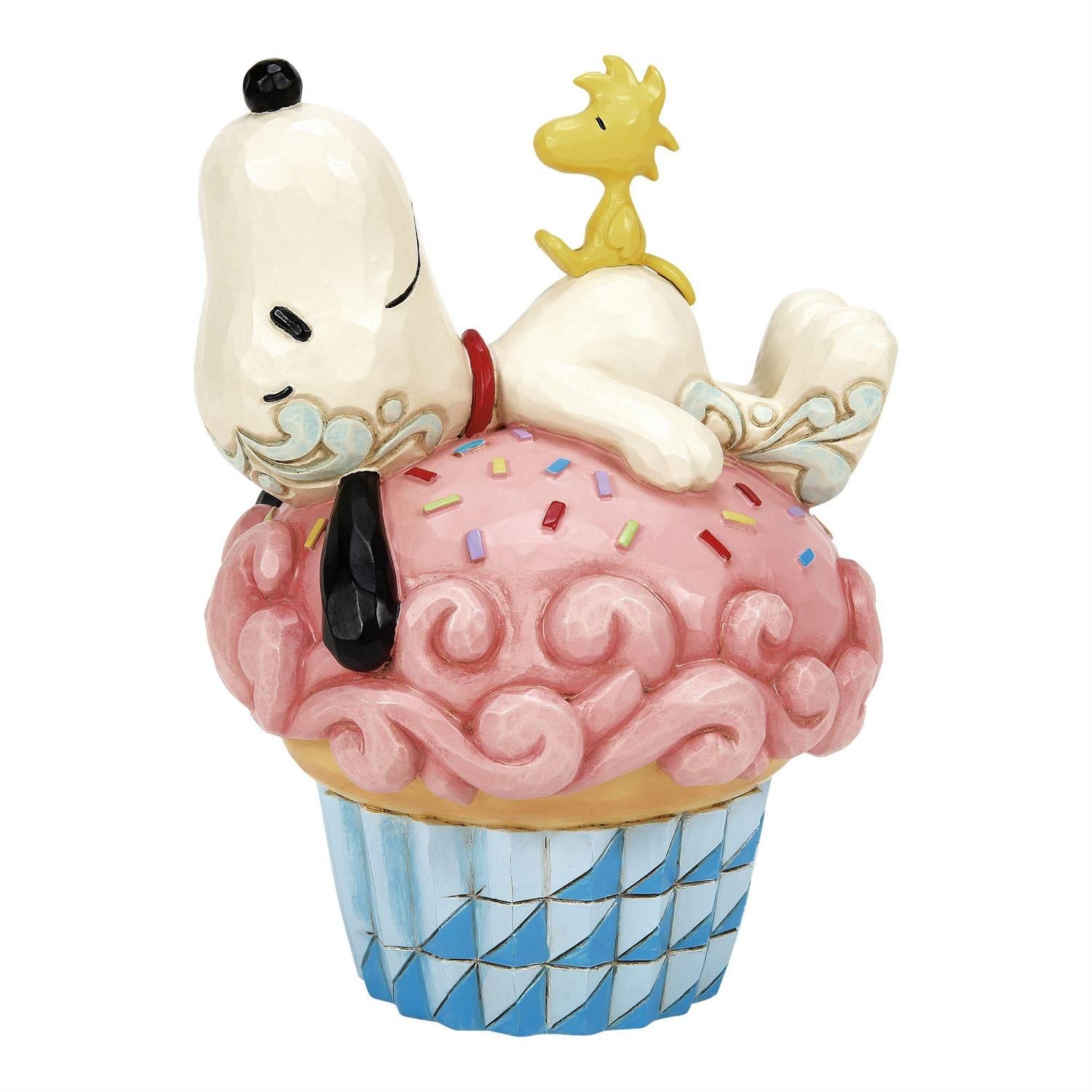 Jim Shore- Peanuts Snoopy Laying on Cupcake