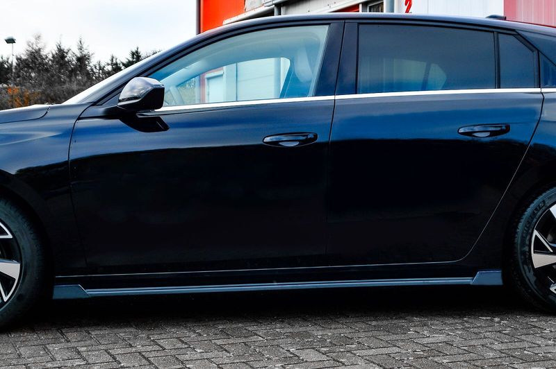 CUP Seitenschweller aus ABS mit Wing vorn + hinten für Opel Astra L CUP Seitenschweller aus ABS mit Wing vorn + hinten für Opel Astra L