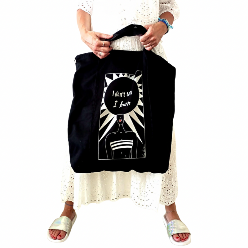 "I don't tan I burn" travel tote bag