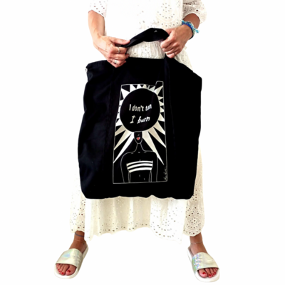 "I don't tan I burn" travel tote bag