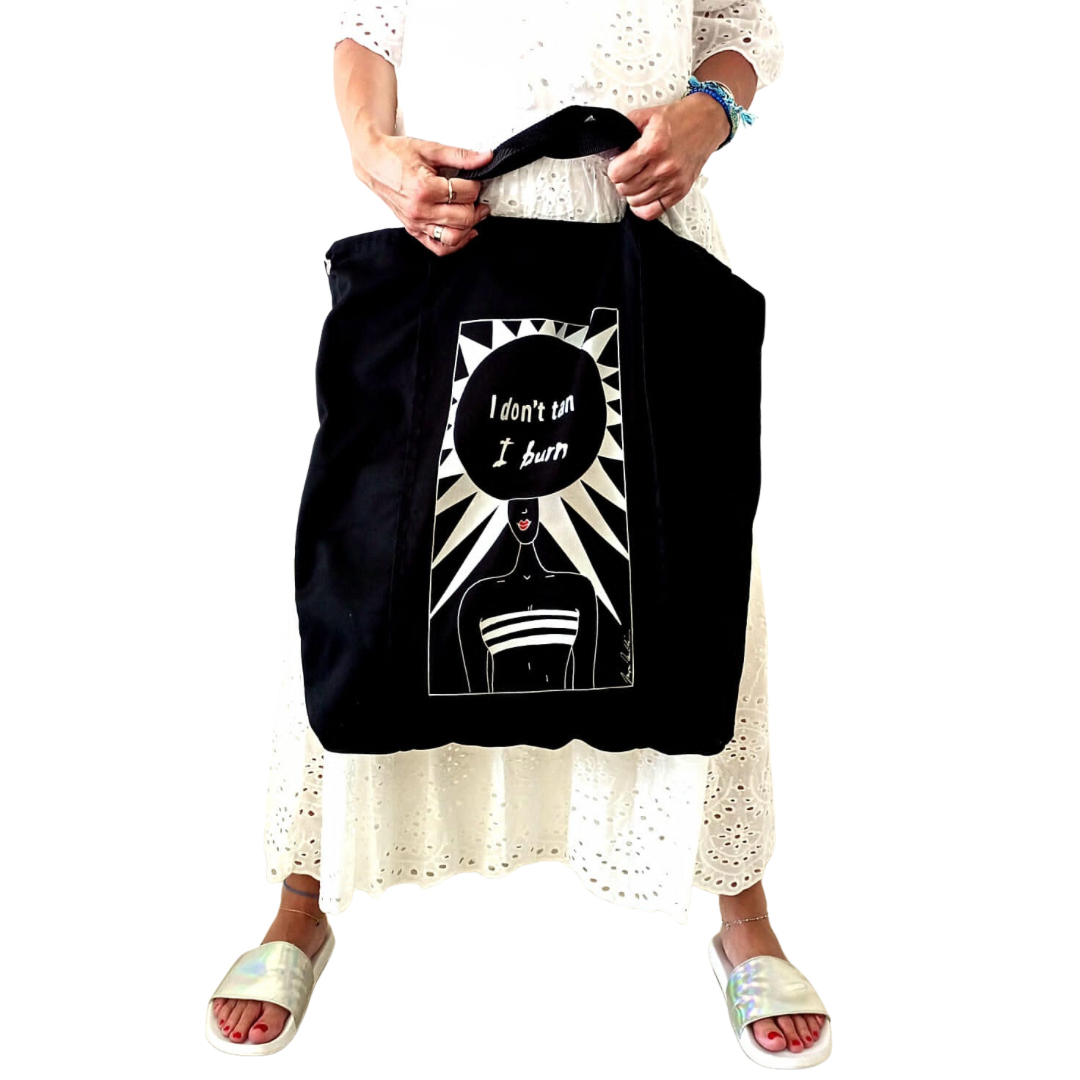 "I don't tan I burn" travel tote bag