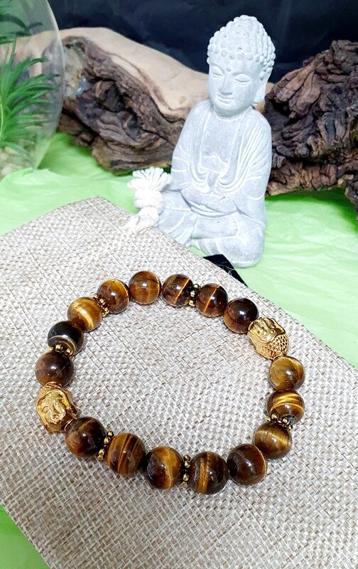 🙏Hommage à Bouddha. Bracelet mixte diam.6,5cm extensible. Perles minérales en véritable œil de tigre. Petites roues intercalaires et têtes de Bouddha en laiton doré