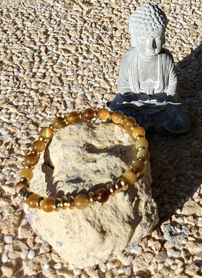 🐅🐯 Très joli bracelet extensible T.standard 18cm. Perles 6mm en véritable Œil de tigre Gold 🐯🐅 Création artisanale. Réalisable en d&#39;autres tailles.