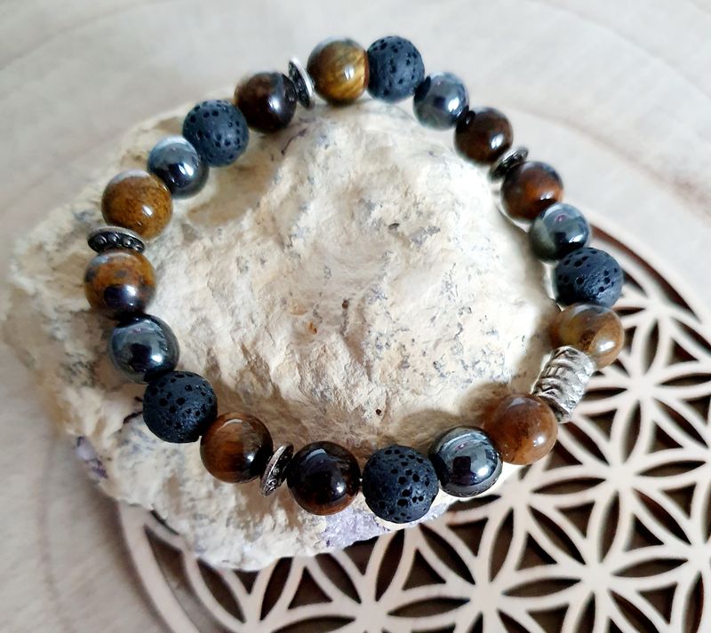 🙏 Bracelet ado mixte, extensible. Perles en Hématite-Roche volcanique- Œil de tigre 🐯 
CONCENTRATION/BONHEUR/FORCE Création artisanale. Modèle unique.