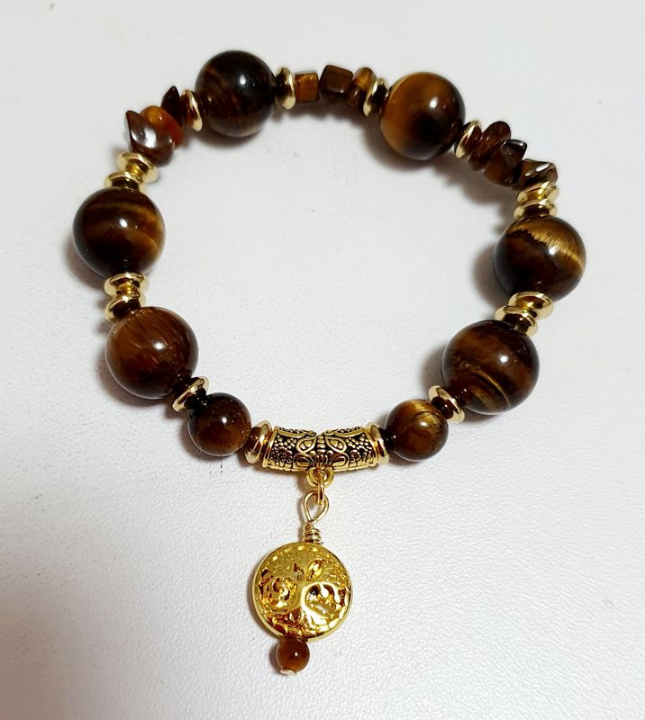 🙏RÉCONFORT/COURAGE/PROTECTION🙏 Superbe bracelet extensible T.standard 18,5cm (Personnalisable) Chips et perles en véritable ŒIL DE TIGRE. Médaillon Arbre de vie en HÉMATITE dorée Fait main.