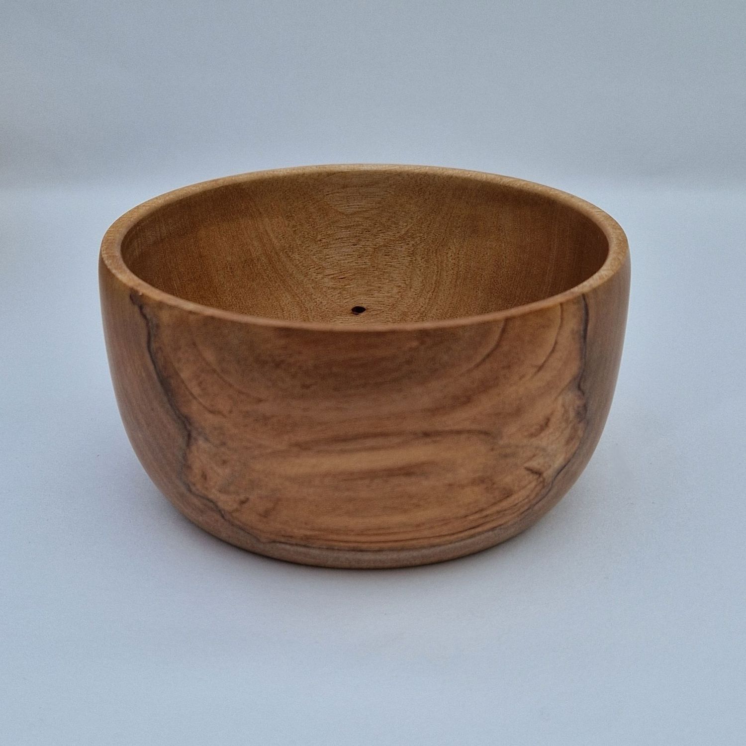 Small wooden snack pot with smooth finish and visible grain, handcrafted for serving nuts, fruit, or small treats