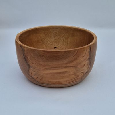 Small wooden snack pot with smooth finish and visible grain, handcrafted for serving nuts, fruit, or small treats