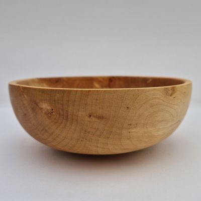 Birch snack pot with smooth rounded shape and visible grain, handcrafted for serving savoury snacks 