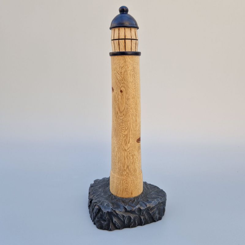 Handcrafted oak Lighthoose with dark blue top, pyrographed windows, on a painted textured base with gentle, wonky charm