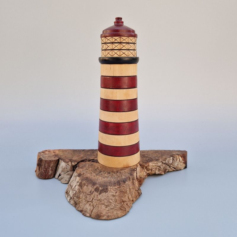 Handcrafted birch Lighthoose with red stripes, pyrographed windows, on a textured live-edge elm base with coastal charm