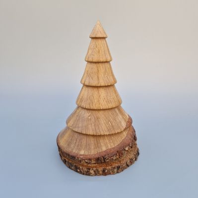  Tiered oak tree with six stacked segments and live-edge base. Finished with oil and wax to highlight natural grain.