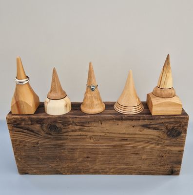 Ring holders handcrafted from a selection of Scottish wood.