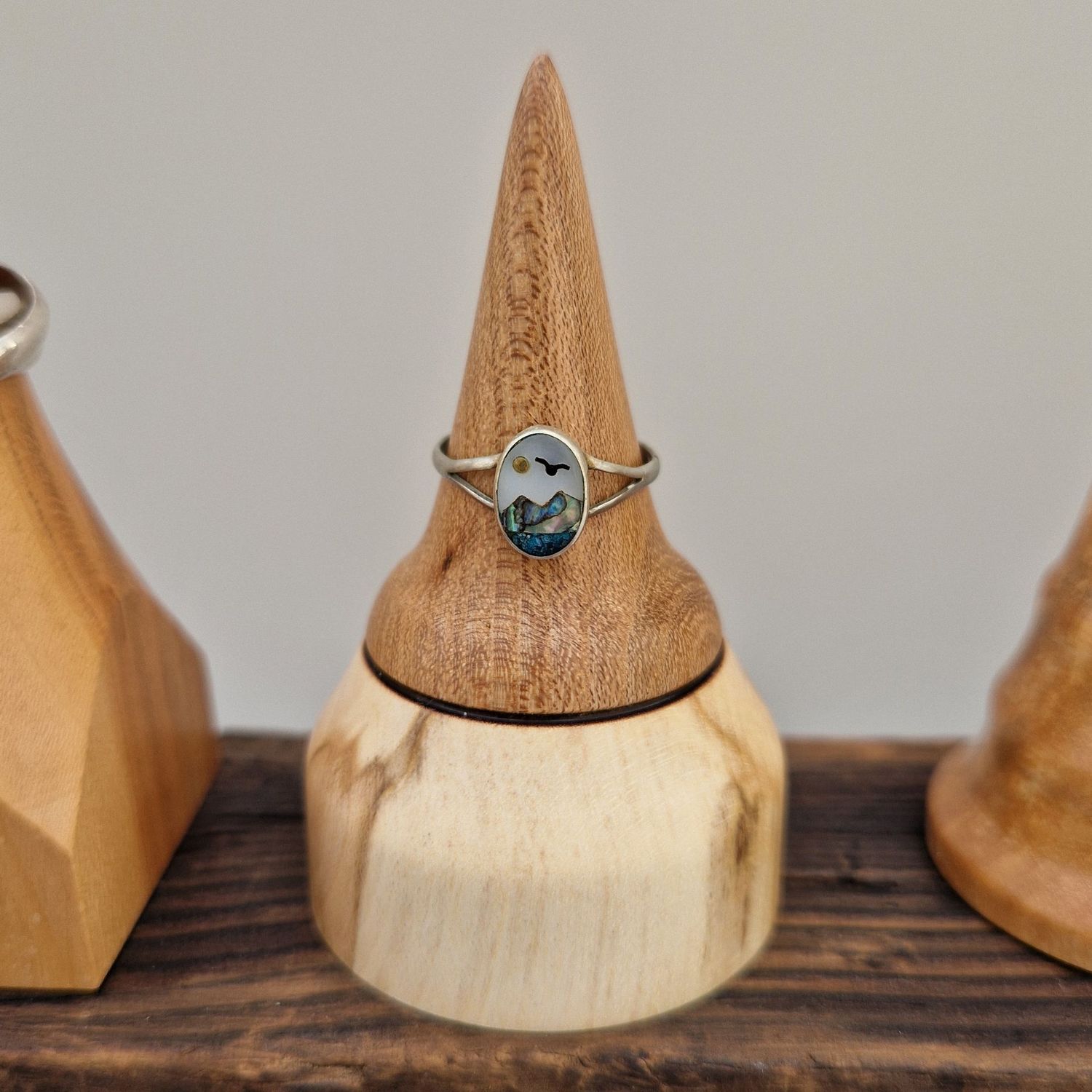 Ring holder with cone shaped elm top and square spalted sycamore base, joined by a wire-burned ring.