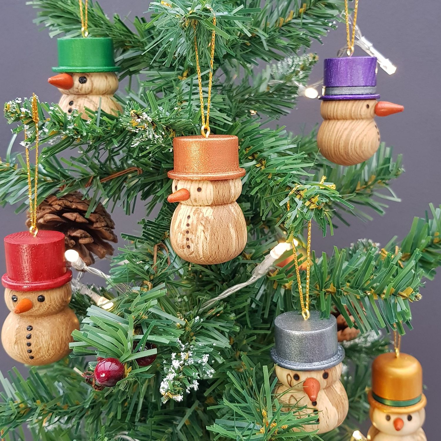Large Wooden Snowmen Baubles with Painted Hats Large Wooden Snowmen Baubles with Painted Hats