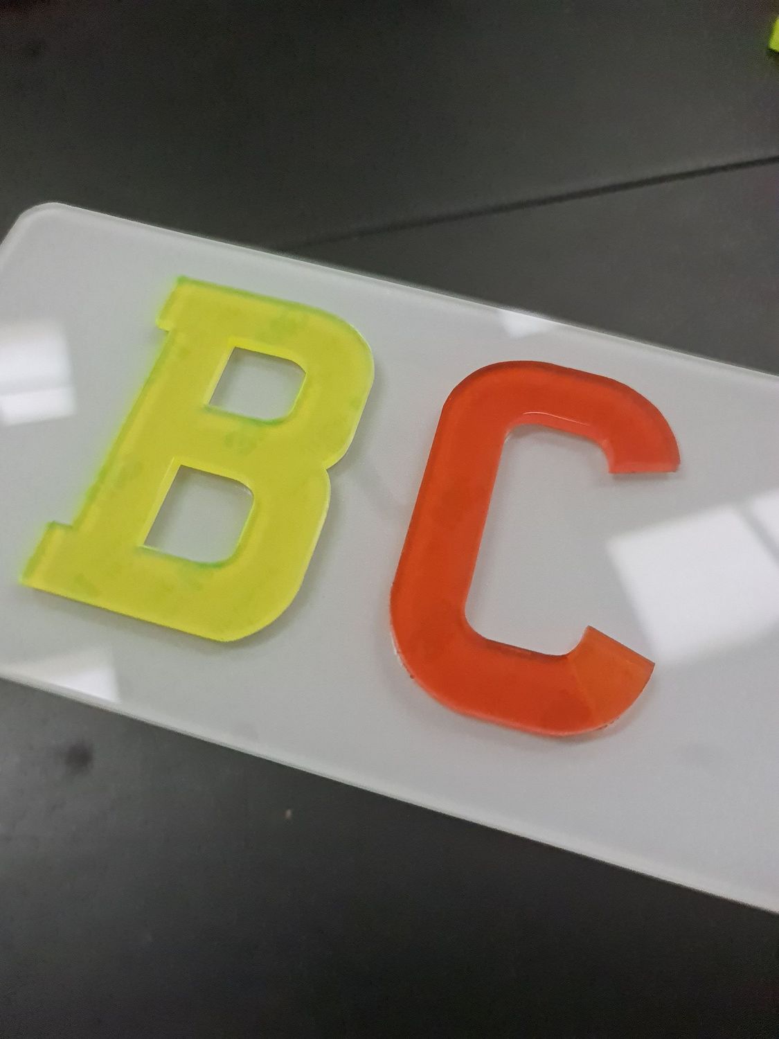 Coloured letter show number plates