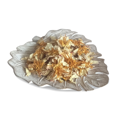 Close-up of premium dried white lotus flowers, perfect for herbal tea, aromatherapy, and relaxation.