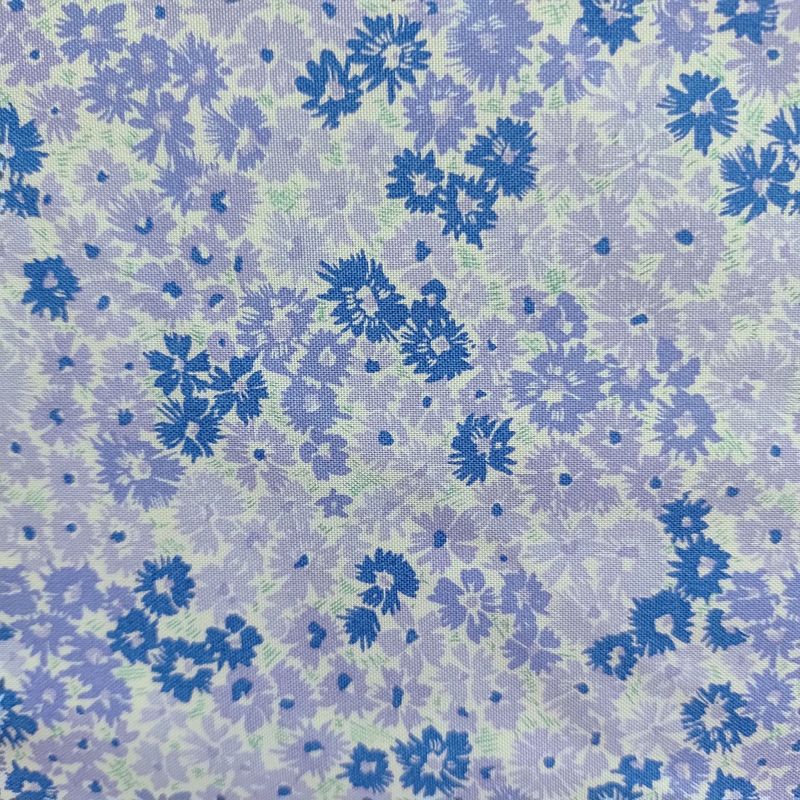 Tela de flores azules y lilas