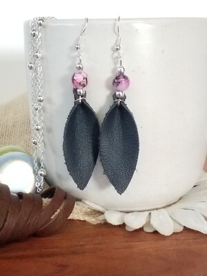 Dark blue pinched leaf shape with purple glass bead