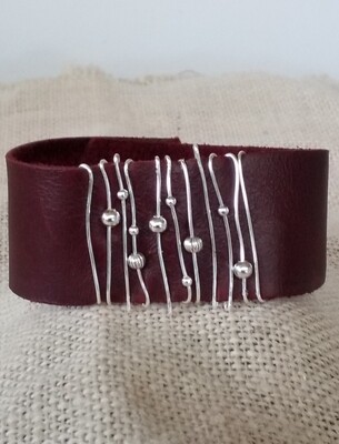 Wire wrapped leather cuff