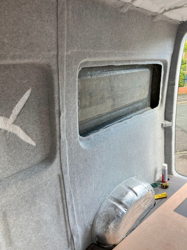 Episode 4 - Panelling and taping wall joints, roof insulation and carpet lining