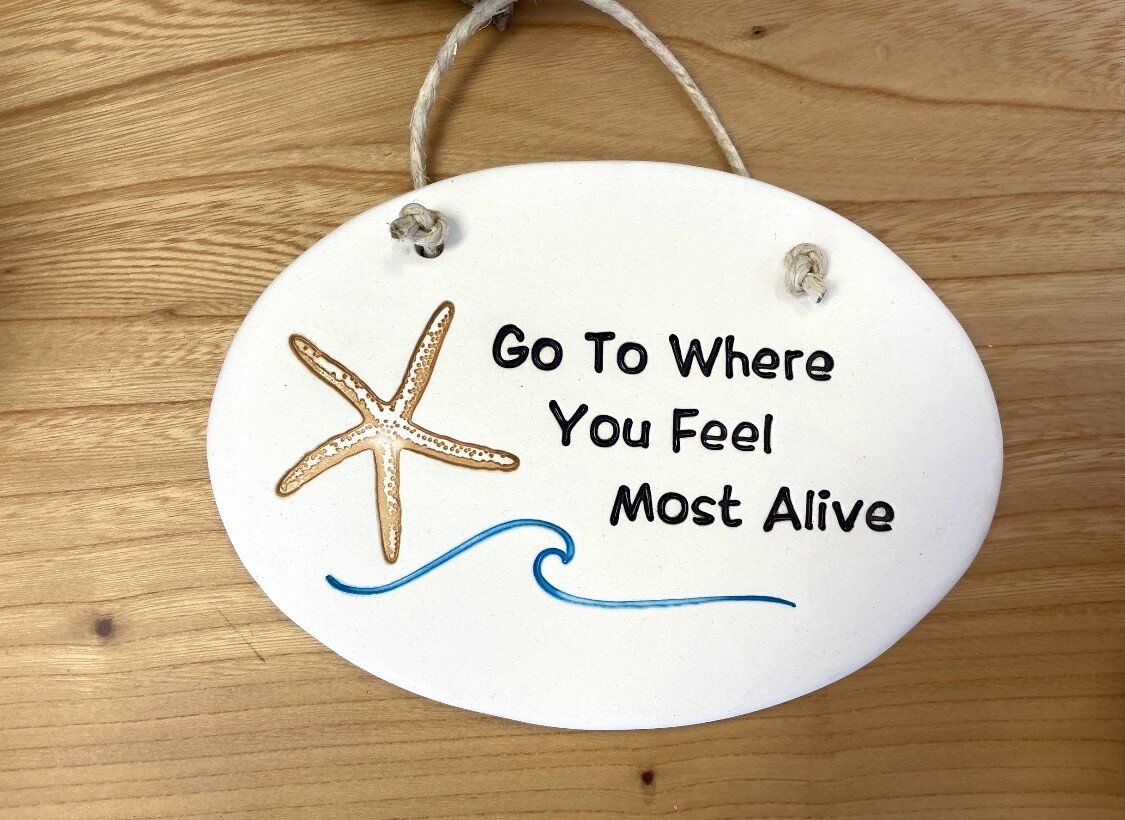 Go Where You Feel Most Alive Sign