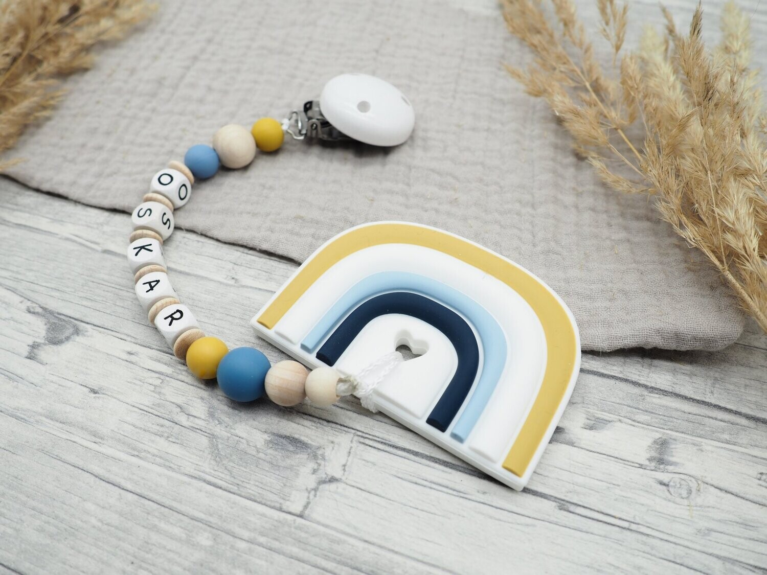 Beißkette Regenbogen senfgelb, blau