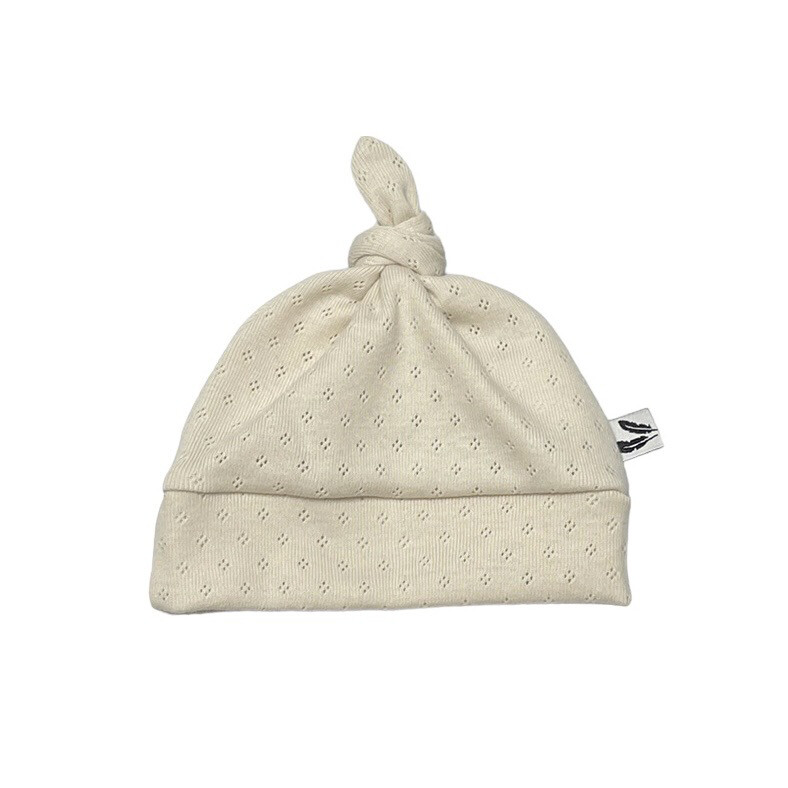 Knoopmutsje pointelle natural beige