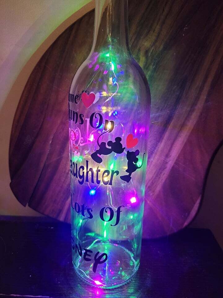 This home Runs on Disney wine bottle light.