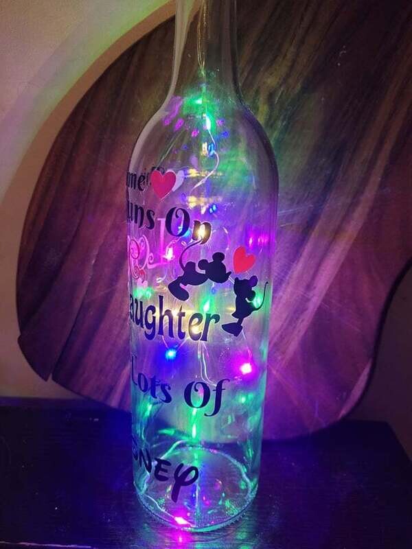 This home Runs on Disney wine bottle light.
