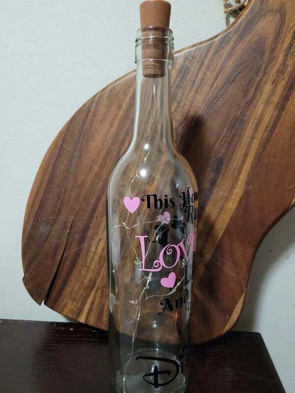 This home Runs on Disney wine bottle light.