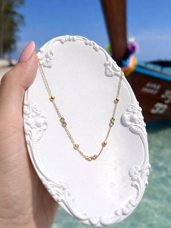 Collier Infini “À Contresens” – Le symbole d’un amour éternel en acier inoxydable