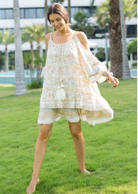 Robe tunique avec bretelles tressées et pompons