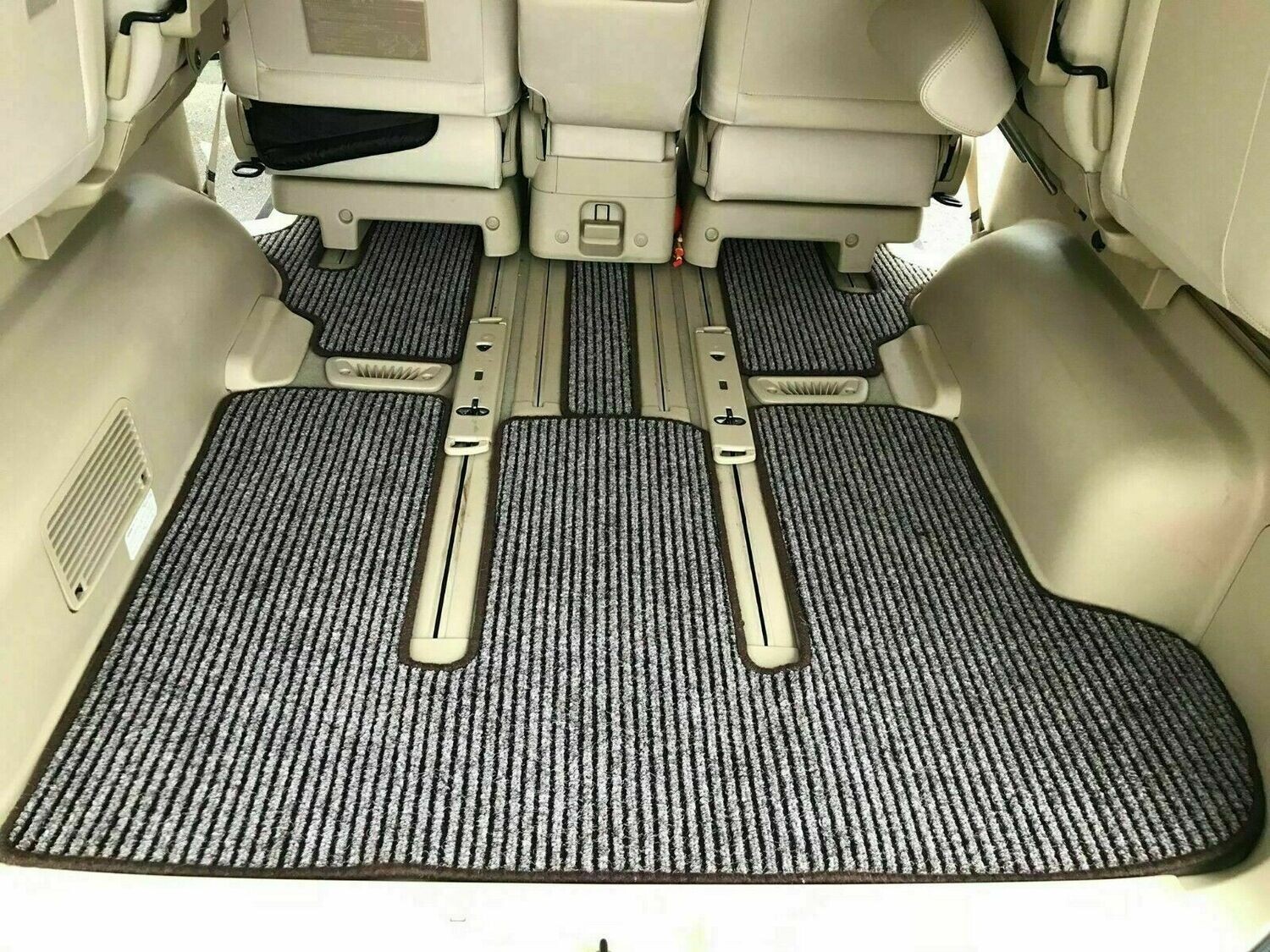 Tailored ribbed rear carpet mats in a Nissan Elgrand