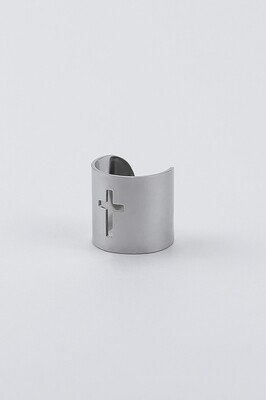 Ring with a decorative hole in shape of  cross