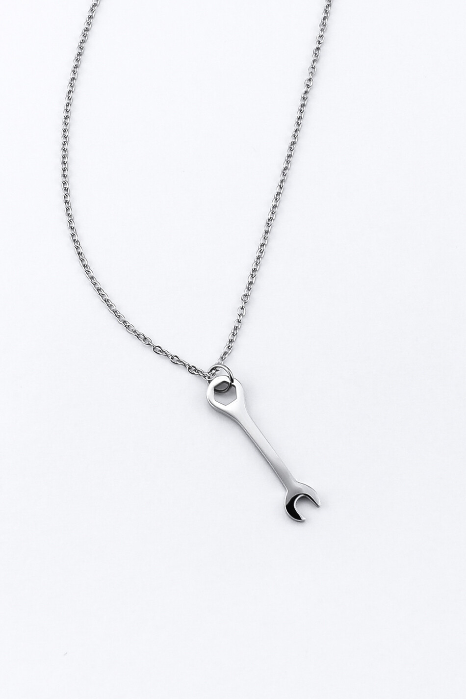 Pendant "Wrench" on a thin chain