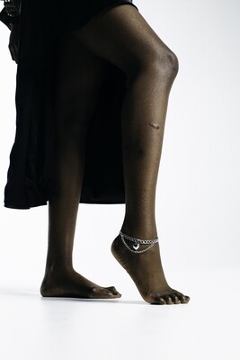 Massive ankle bracelet with a heart pendant