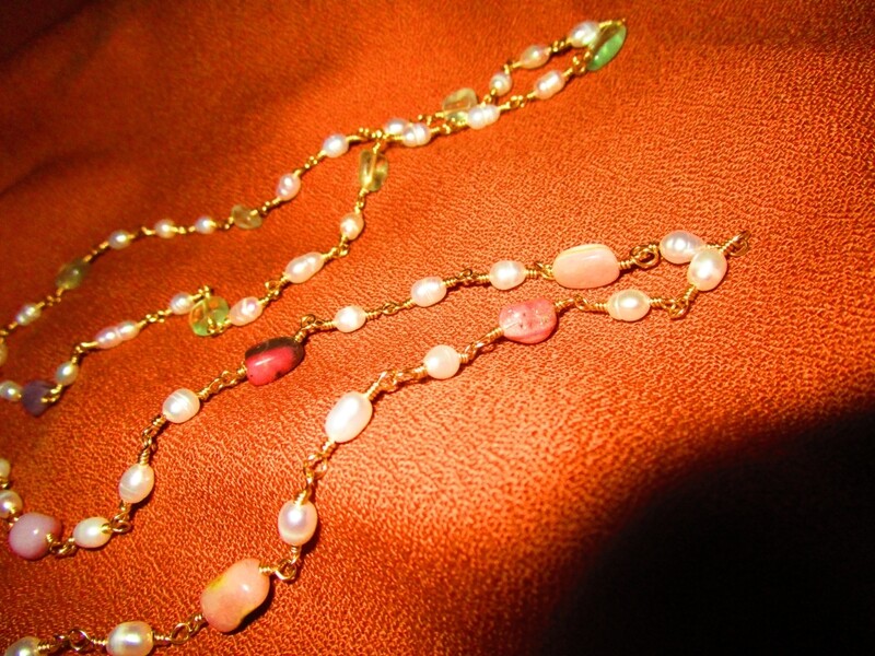 Necklaces with pink or green stones