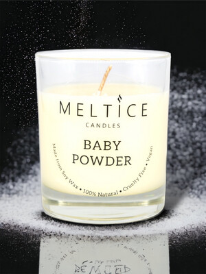 Baby powder-scented candle in a glass jar. 