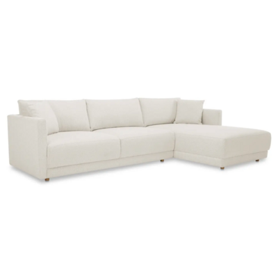 The Bryn Sectional, finished in a cream boucle fabric, size 115.5” W X 70.5” D X 31.5” H, available in left or right orientation.
