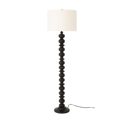 Inspired by vintage table legs for an heirloom appeal, the Gwen floor lamp features black-finished mango wood and a spherical form masterfully achieved by the turned wood base. A textured cotton shade adds dimension to the smooth, organic base.