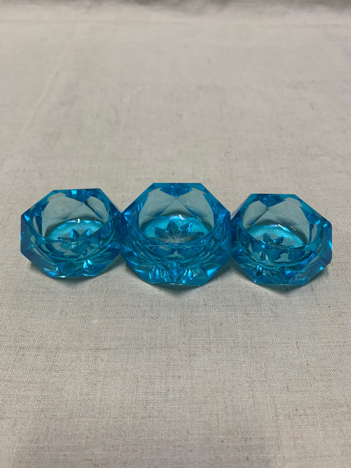 Trois porte bougies