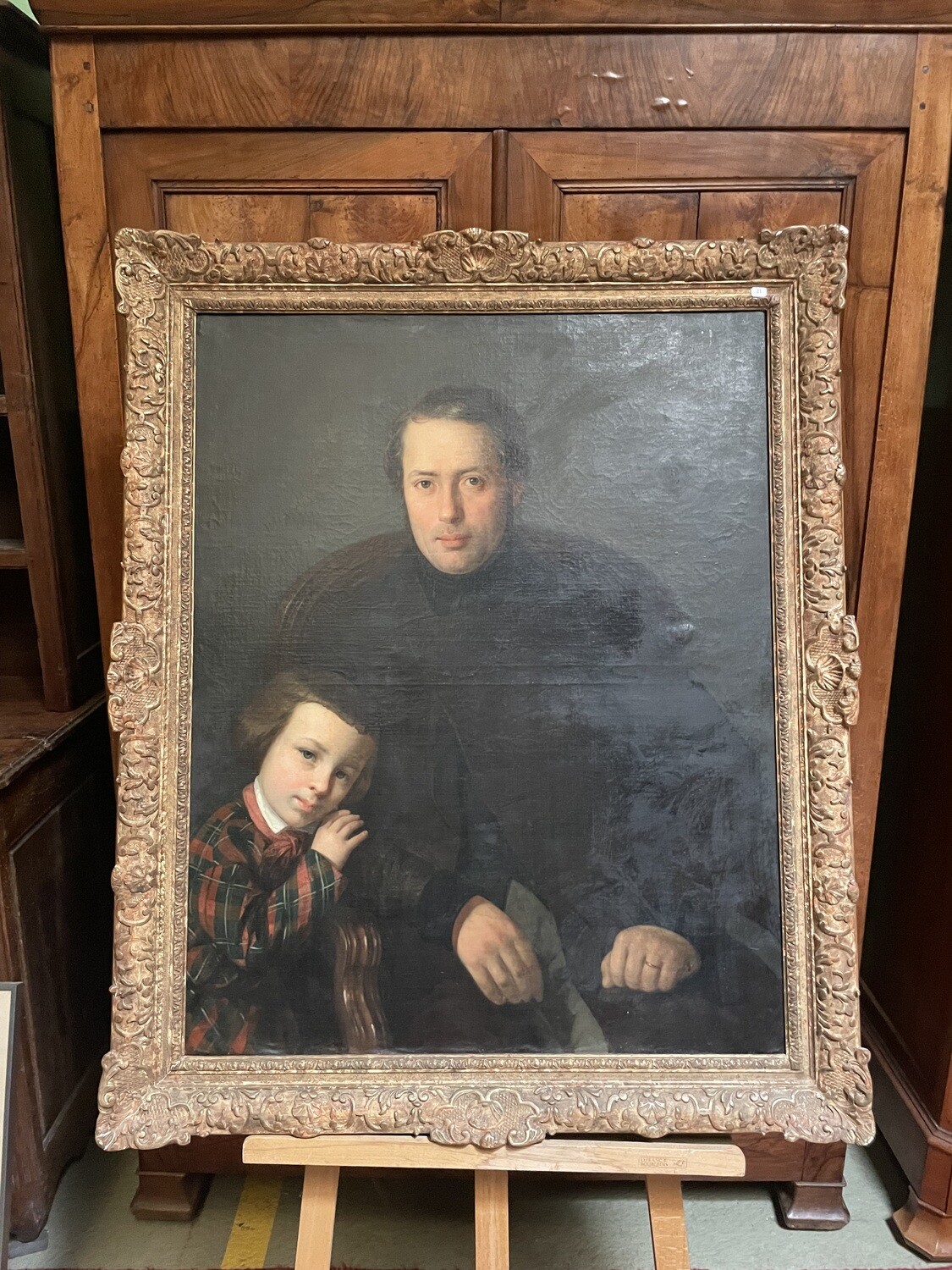 ECOLE XIXe. Portrait d'homme et son fils. Huile sur toile. 91,5x73 cm. Restaurations - petits accidents