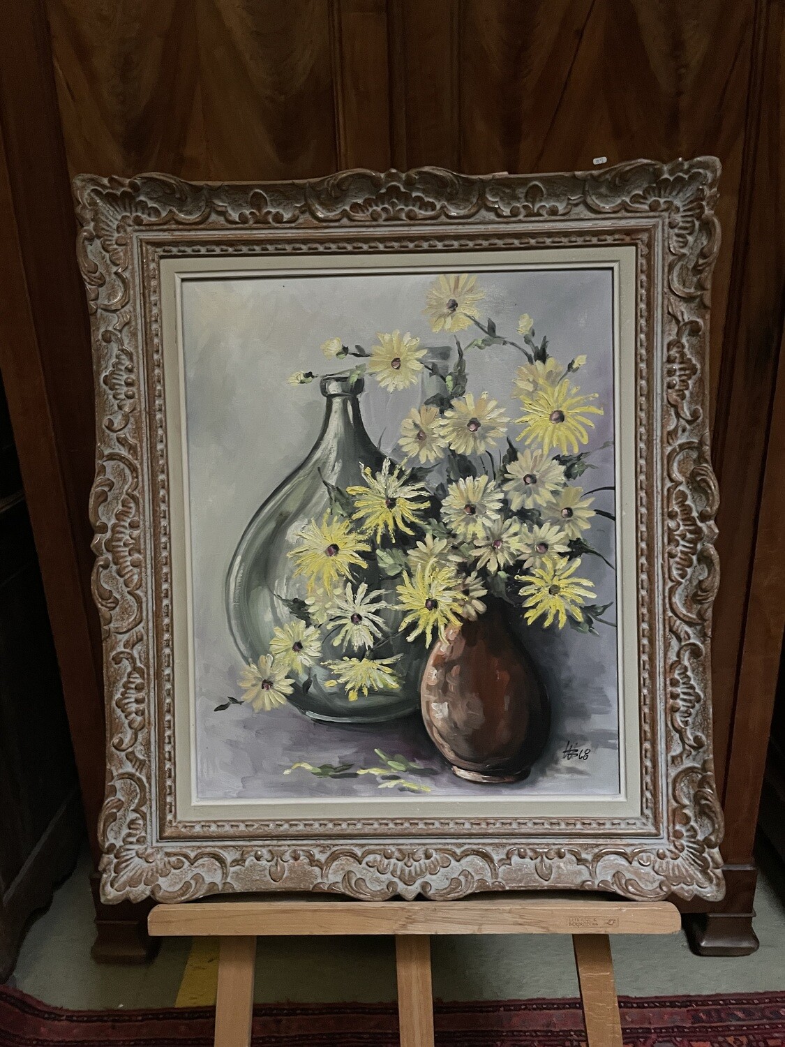 Ecole Française : "Fleurs dans un vase et bonbonne", monogrammée en bas à droite et datée 68 - 61 x 51 cm (Atelier 46 rue D'Orsel, Paris)