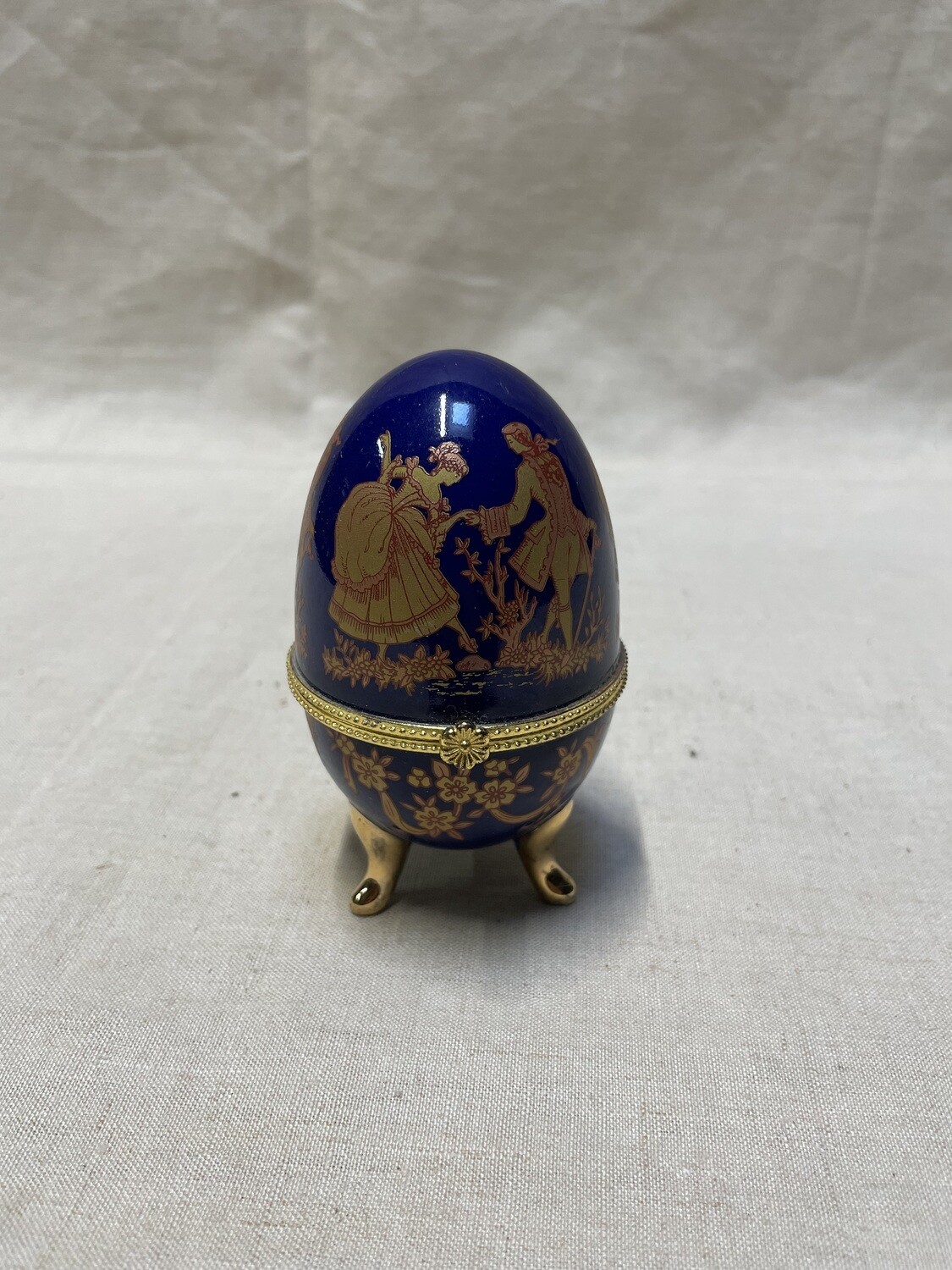 Œuf fond bleu avec détail doré - Hauteur 10 cm