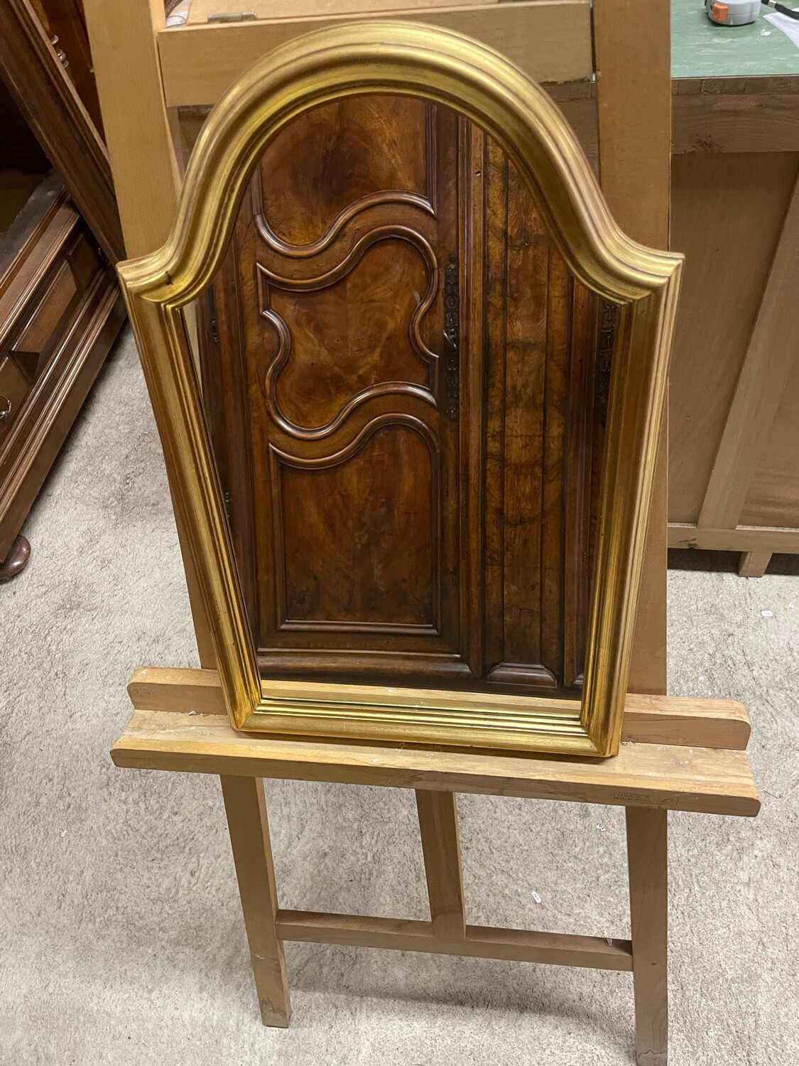Miroir en bois doré 58x36.5 cm