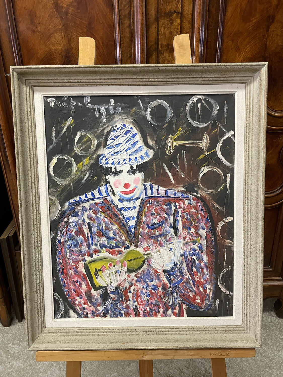 Ecole Française du XX° "Le clown musicien" Huile sur toile, signé en haut à gauche et datée 1960 - 61 x 
50
